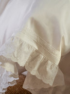 Cotton lace and eyelet ruffle detailing on the Chantilly duvet cover