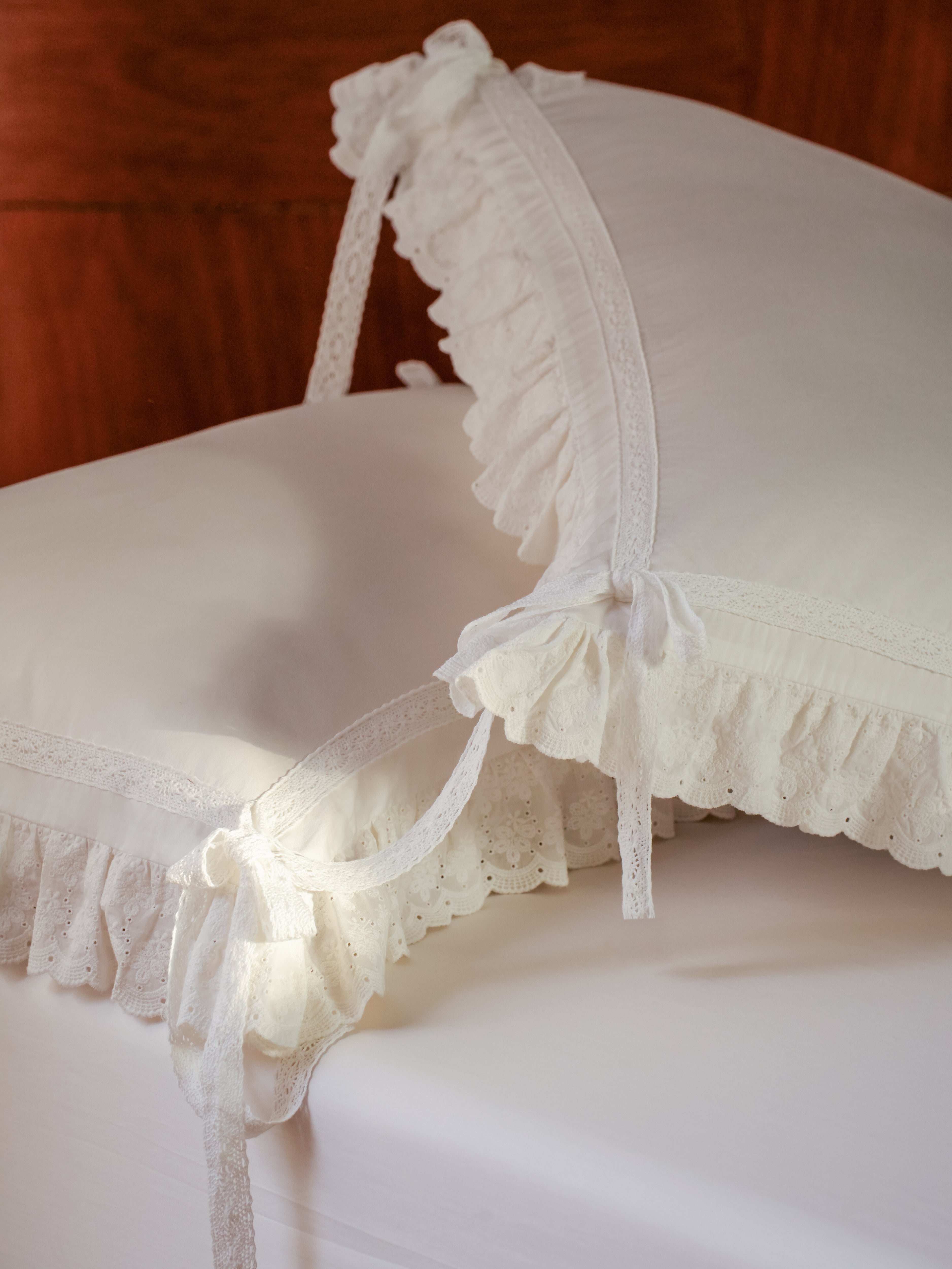 Chantilly pillowcases with scalloped eyelet ruffles and cotton lace bow ties