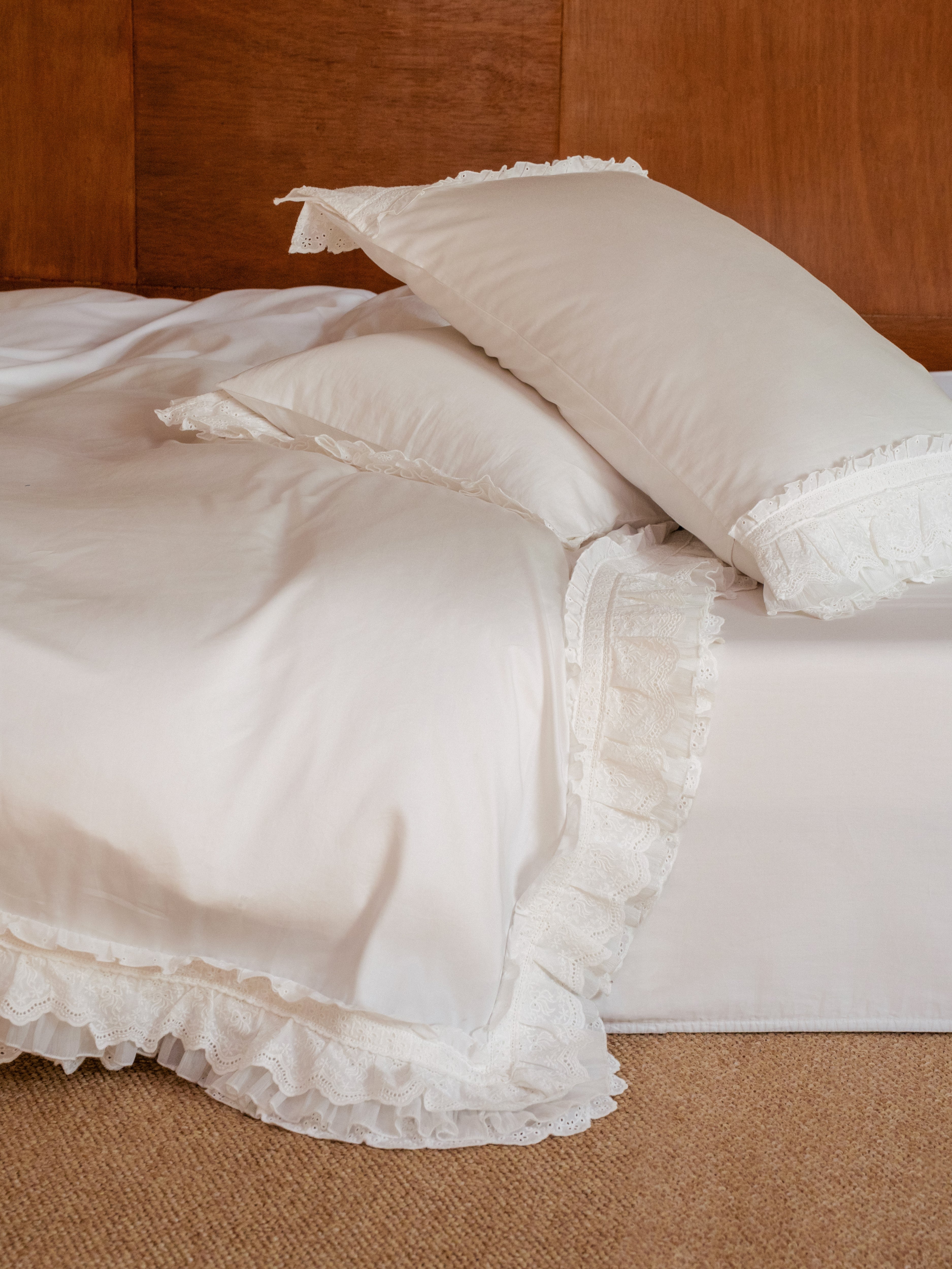 Crème duvet cover and pillowcases with layered scalloped ruffle detailing