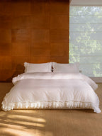 Crème romantic bedding set with layered ruffles in ivory Egyptian cotton sateen