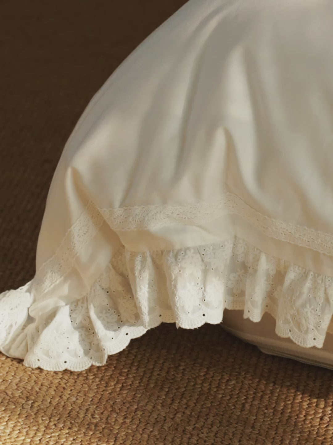 Close-up of ruffle and bow detailing on the Chantilly Egyptian cotton bedding set